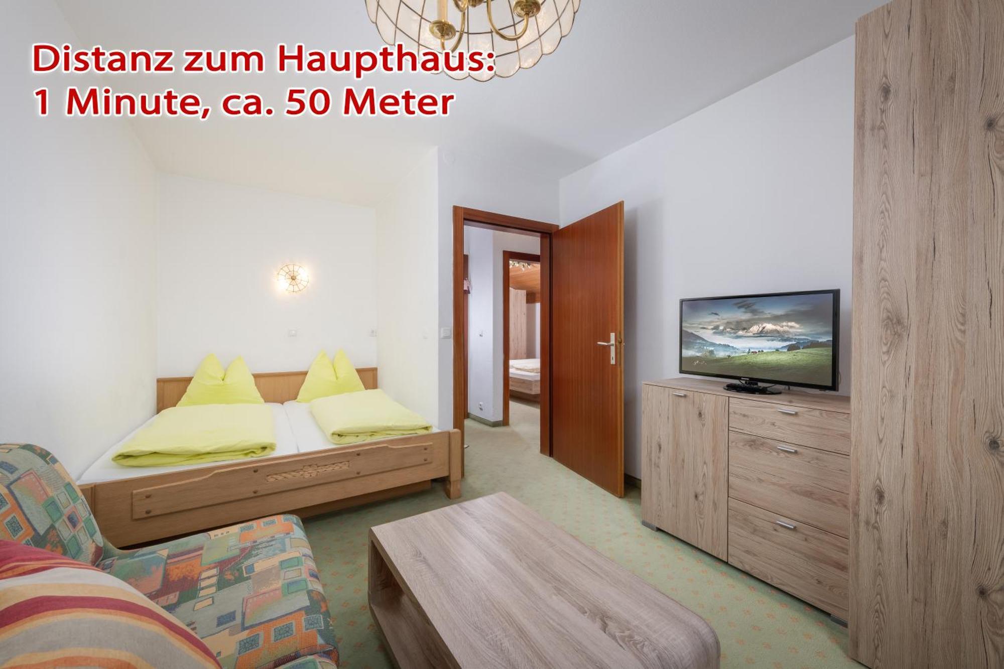 Familienhotel Central Sankt Johann in Tirol Pokoj fotografie